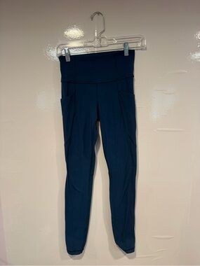 High-Waist Navy Teal Athleta Salutation Active Leggings with Side Pockets